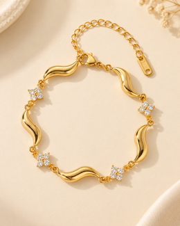 Pulseira Flora, pulseira dourada de ondas com flores de zircónias — Solène Lisboa